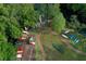 Aerial shot showcasing the community's kayak launch area and scenic walking paths surrounded by lush greenery at 934 Deerwood Loop, Longwood, FL 32779
