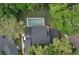 A lovely backyard pool is visible in this aerial view of the property at 934 Deerwood Loop, Longwood, FL 32779