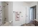 Bathroom featuring a shower-tub combo and wood-look flooring at 934 Deerwood Loop, Longwood, FL 32779