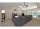 Living room boasts fireplace, vaulted ceilings, and views of the outdoor pool at 934 Deerwood Loop, Longwood, FL 32779