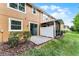 Townhome exterior with a small concrete patio and minimal backyard space at 9349 Sweet Maple Ave, Orlando, FL 32832