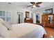 Comfortable bedroom with a bed, dresser, and closet at 1106 Ayrshire St, Orlando, FL 32803