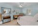 Bright bedroom with comfortable furnishings, lots of natural light, and cozy decor at 1106 Ayrshire St, Orlando, FL 32803