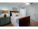 Relaxing bedroom featuring a wooden bed frame and bedside table at 1106 Ayrshire St, Orlando, FL 32803