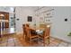 Dining room with wooden table set and views to kitchen area at 1106 Ayrshire St, Orlando, FL 32803