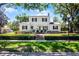 Charming two-story home with classic architecture and a beautifully landscaped front yard at 1106 Ayrshire St, Orlando, FL 32803