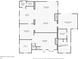 Detailed first floor plan featuring kitchen, living room, primary bedroom and bathroom, and laundry room at 1106 Ayrshire St, Orlando, FL 32803