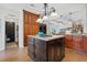 Spacious kitchen with a large island, stainless steel appliances, and custom cabinetry at 1106 Ayrshire St, Orlando, FL 32803