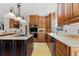 Bright kitchen with granite countertops and stainless steel appliances at 1106 Ayrshire St, Orlando, FL 32803