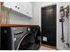 Functional laundry room with modern washer and dryer units at 1106 Ayrshire St, Orlando, FL 32803