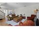 Spacious living room with hardwood floors and a comfortable seating arrangement at 1106 Ayrshire St, Orlando, FL 32803
