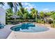 Inviting in-ground pool with a sundeck and outdoor dining area at 1106 Ayrshire St, Orlando, FL 32803