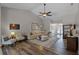 Spacious living room with vaulted ceilings, ceiling fan, and stylish decor at 1124 Shadowbrook Trl, Winter Springs, FL 32708