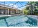 Refreshing pool area with a screened enclosure and a -safe fence at 1124 Shadowbrook Trl, Winter Springs, FL 32708