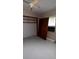 Empty bedroom featuring closet space, a window, and simple design at 11625 Churchill St, Orlando, FL 32817