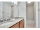 Well-appointed bathroom featuring a granite countertop and tiled shower at 11885 Padua Ln, Orlando, FL 32827