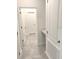 Hallway featuring tile floor, recessed lighting, and built-in desk at 1374 Brentwood Dr, Kissimmee, FL 34746