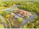 Community amenities include shuffleboard and tennis courts, a playground and a community center at 14961 Sw 38Th Cir, Ocala, FL 34473