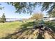 Lakeside community park with picnic tables, BBQ grills, and docks, perfect for outdoor gatherings at 151 N Orlando Ave # 115, Winter Park, FL 32789