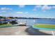 Gated lake access point with canoe storage, offering convenient waterfront recreation for residents at 151 N Orlando Ave # 115, Winter Park, FL 32789