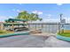 Gated lake access point with canoe storage, offering convenient waterfront recreation for residents at 151 N Orlando Ave # 115, Winter Park, FL 32789