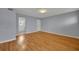 Inviting living room with wood floors and neutral decor, perfect for relaxation and entertaining at 151 N Orlando Ave # 115, Winter Park, FL 32789