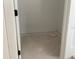 A walk-in pantry with ample shelving ready for customization and storage solutions at 15483 Hamlin Park Drive, Winter Garden, FL 34787