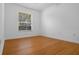 Bedroom with hardwood floor and window at 1803 Glenbay Ct, Windermere, FL 34786