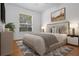 Bedroom with a bed and large window at 1803 Glenbay Ct, Windermere, FL 34786