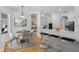 Bright dining area features modern furnishings and decor and is open to the kitchen and other living spaces at 1803 Glenbay Ct, Windermere, FL 34786