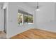 Bright dining area features large windows with a view of the outdoor pool at 1803 Glenbay Ct, Windermere, FL 34786