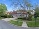Charming two-story home with manicured landscaping and a three-car garage at 1803 Glenbay Ct, Windermere, FL 34786