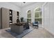 Spacious office space with built-in cabinets, desk, and seating at 1803 Glenbay Ct, Windermere, FL 34786