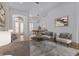 Bright and airy living room with hardwood floors, neutral furniture, and stylish decor at 1803 Glenbay Ct, Windermere, FL 34786