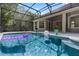 Backyard pool with raft, beach ball, and view of the home's exterior at 1803 Glenbay Ct, Windermere, FL 34786