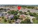 Aerial shot of house in a suburban area with easy access to highway at 235 Largovista Dr, Oakland, FL 34787