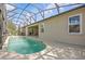 Enjoy the pool with screened-in enclosure, perfect for outdoor relaxation and entertaining in style at 235 Largovista Dr, Oakland, FL 34787