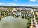 Expansive community featuring a lake, pool, clubhouse, and amenities at 2432 Tangier Dr, Kissimmee, FL 34747