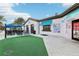 Charming exterior view of the community's shops and recreation area, featuring casual outdoor seating at 2432 Tangier Dr, Kissimmee, FL 34747