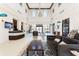 Expansive lobby featuring high ceilings, stylish furniture, and plenty of natural light at 2432 Tangier Dr, Kissimmee, FL 34747