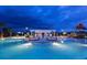 Beautiful community pool featuring lounge areas, a splash pad, and a slide for Gathering fun at 2432 Tangier Dr, Kissimmee, FL 34747