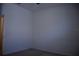 This bedroom has neutral colored walls and neutral carpeting at 245 Brunswick Dr, Davenport, FL 33837