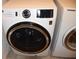 Front-loading GE washer with metallic trim, electronic controls, and UltraFresh Vent System at 245 Brunswick Dr, Davenport, FL 33837