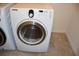Clean and modern front-loading Samsung dryer with metallic trim and electronic controls at 245 Brunswick Dr, Davenport, FL 33837