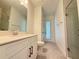 Well-appointed bathroom with modern fixtures and a glass-enclosed shower at 2531 Blue Wave Pl, Oviedo, FL 32765