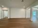 Spacious living room boasts hardwood floors and plenty of natural light at 2531 Blue Wave Pl, Oviedo, FL 32765