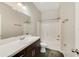 A bathroom featuring a single sink with a bathtub and toilet combination at 2792 Whispering Trails Dr, Winter Haven, FL 33884