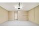 A spacious garage with an epoxy floor and a convenient utility sink at 2792 Whispering Trails Dr, Winter Haven, FL 33884
