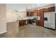 Bright kitchen with stainless steel appliances, wood cabinets, and an open layout at 2792 Whispering Trails Dr, Winter Haven, FL 33884