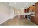 Modern kitchen featuring stainless steel appliances and dark wood cabinetry at 2792 Whispering Trails Dr, Winter Haven, FL 33884